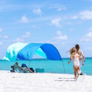 image:imageShibumi Shade 30 Version  WindPowered Beach Tent Shade Canopy  Sets Up in 3 Mins  150 Sq Ft of Shade for up to 8 People  Includes Wind Assist  UPF 50 Sun ProtectionRoyal Blue  Teal